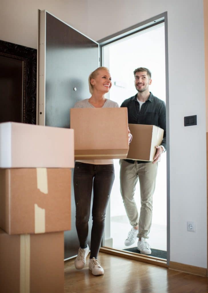 Couple moving into new home