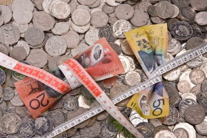 Recession Australia Note Money Economy Squeeze Tighten Save Saving Budget Cut 300x200