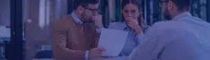 property buyers reviewing documents for home buying